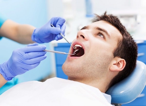 چه زمانی باید به دندانپزشک مراجعه کنم؟